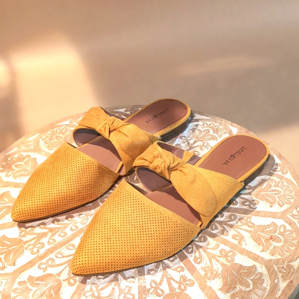 Indigo rd is mustard yellow flats